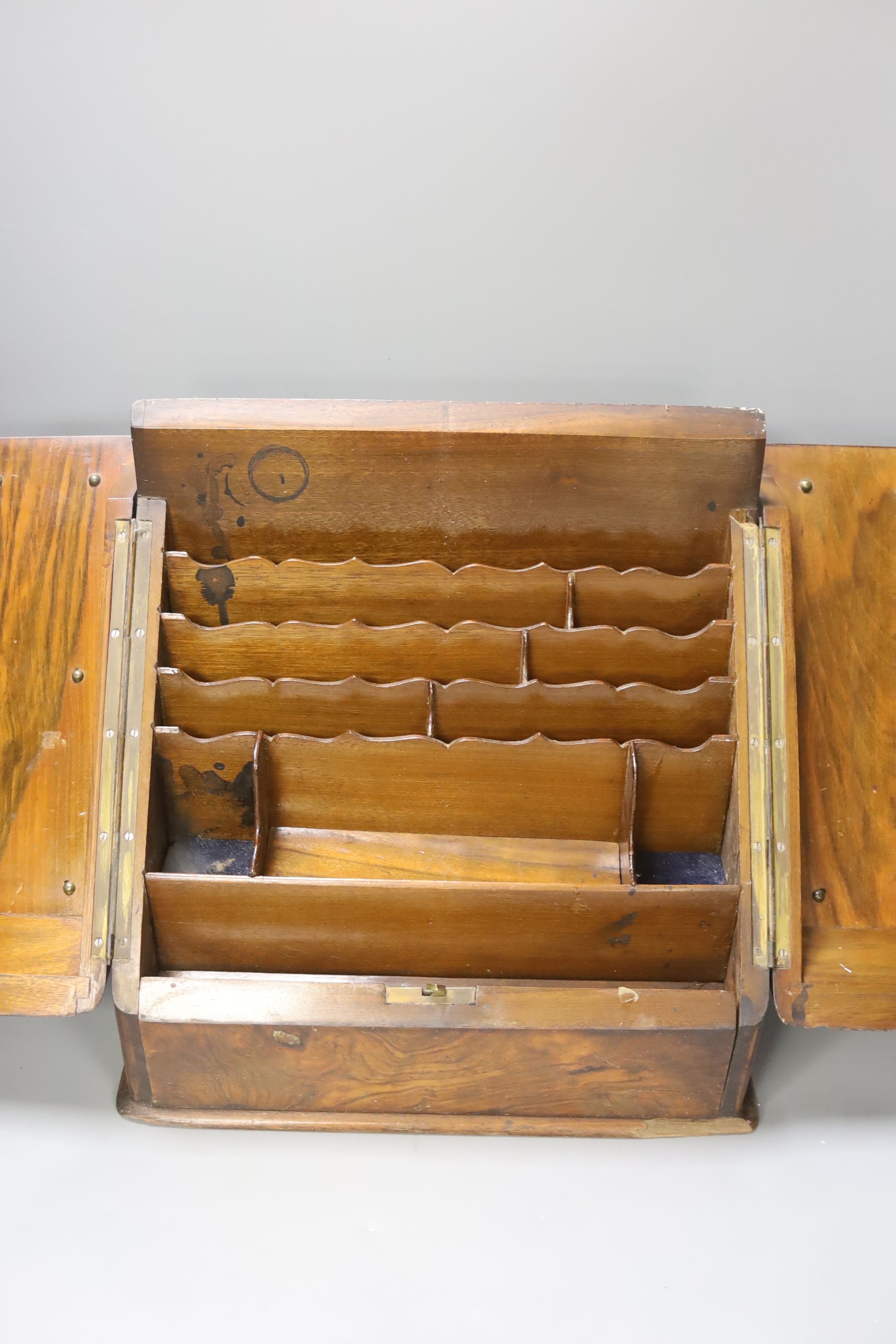 A Victorian walnut stationary cabinet, an Edwardian inlaid oval tray and a group 7 brass fingerplates